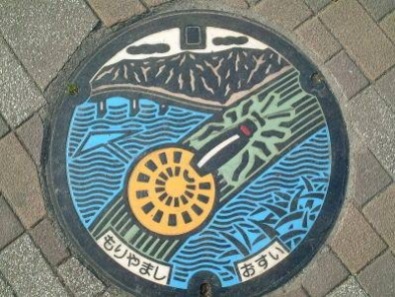 Moriyama has firefly art on its sewer covers